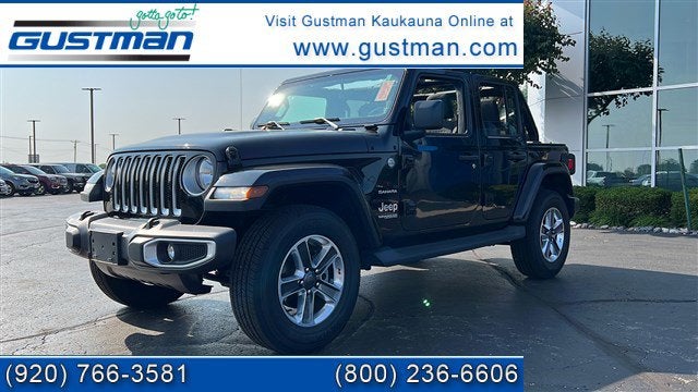 2019 Jeep Wrangler Unlimited Sahara 4x4 in Black — front three-quarter view