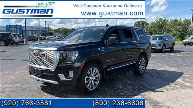 2022 GMC Yukon Denali in Midnight Blue Metallic — front three-quarter view