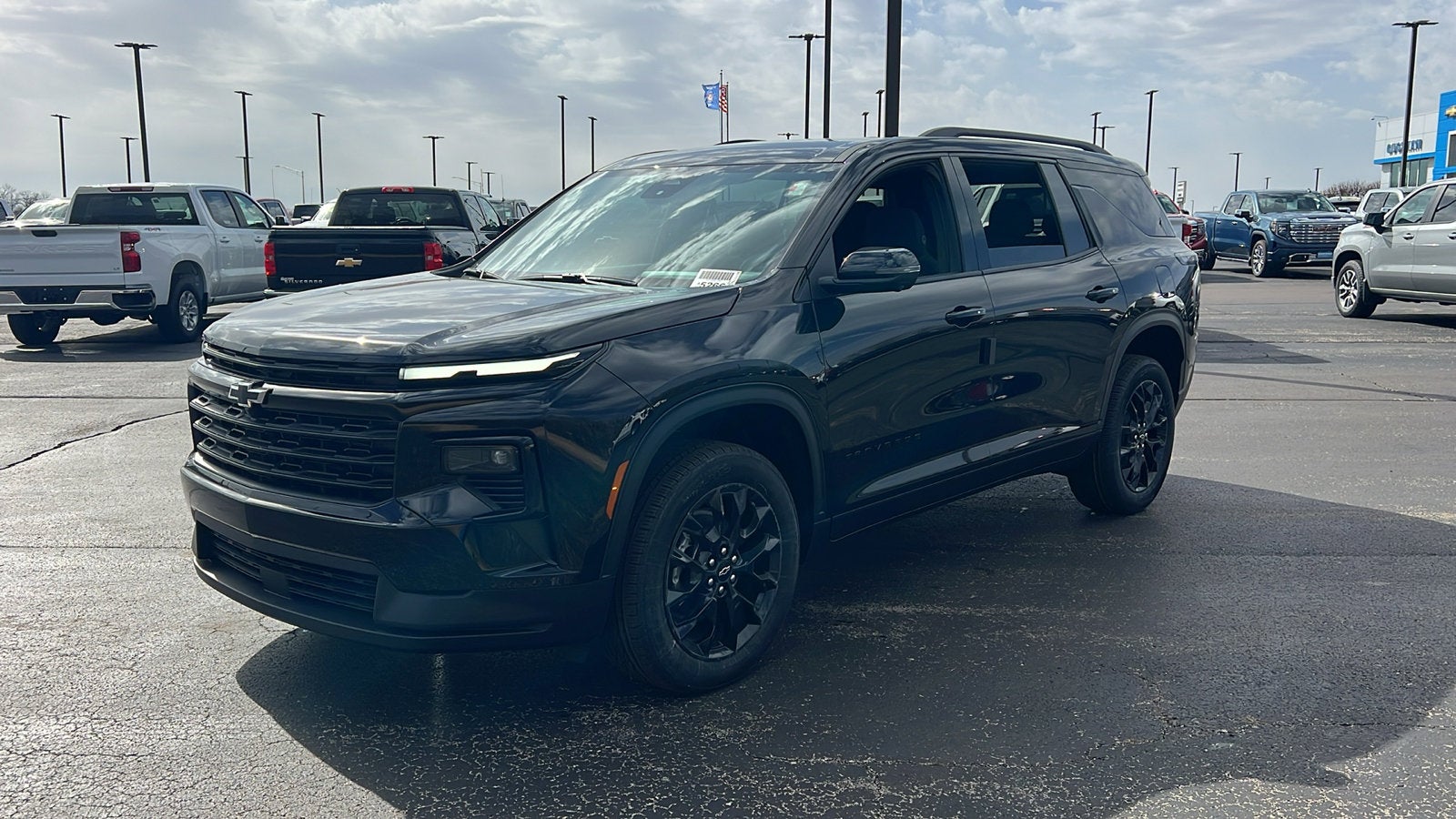 2026 Chevrolet Traverse LT in Mosaic Black Metallic — front three-quarter view