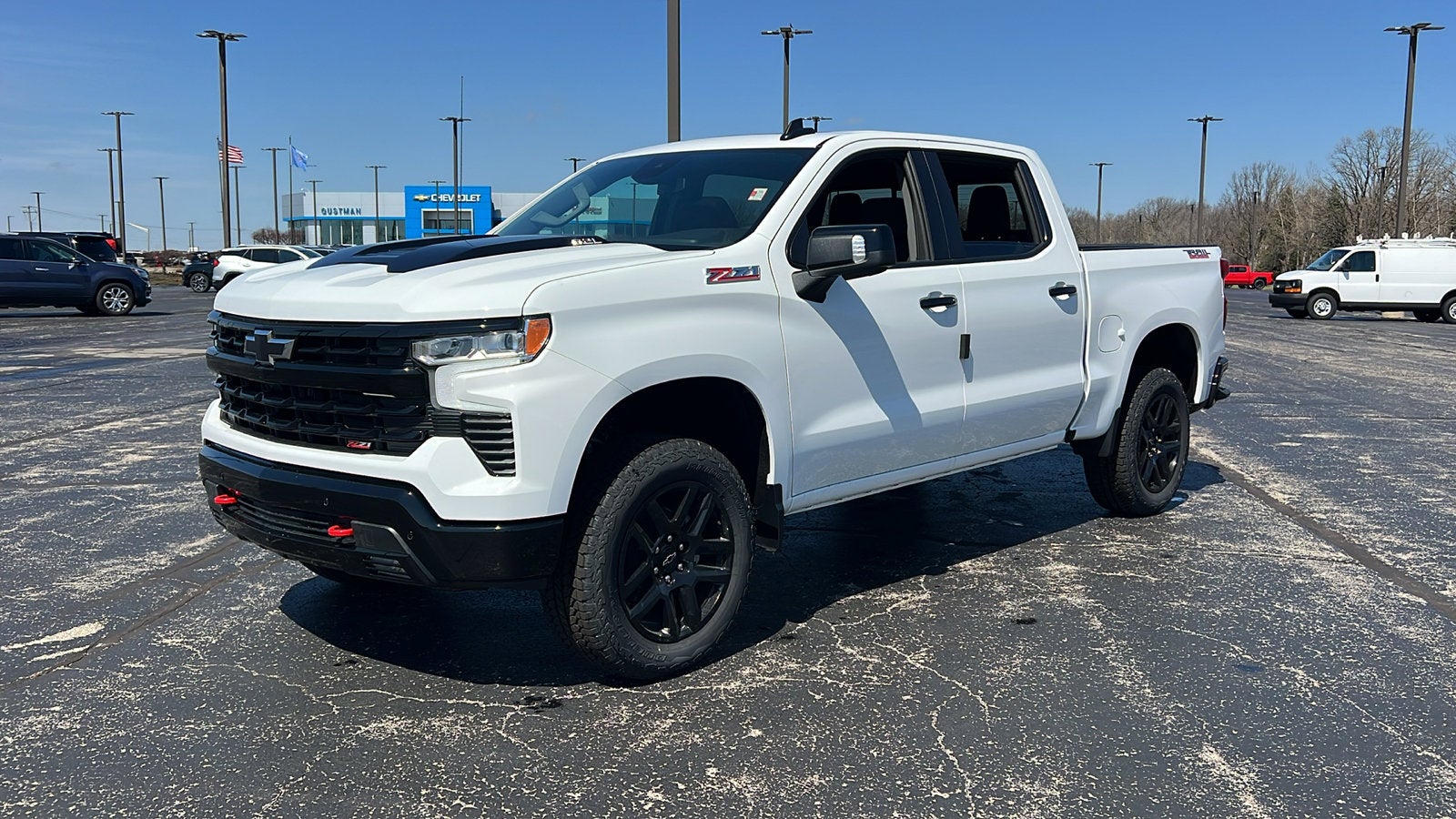 2026 Chevrolet Silverado 1500 LT Trail Boss in Summit White — front three-quarter view